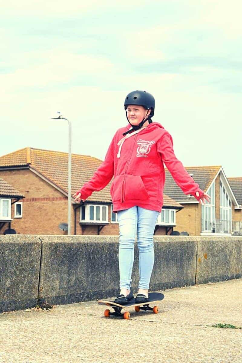 young girl skateboarding