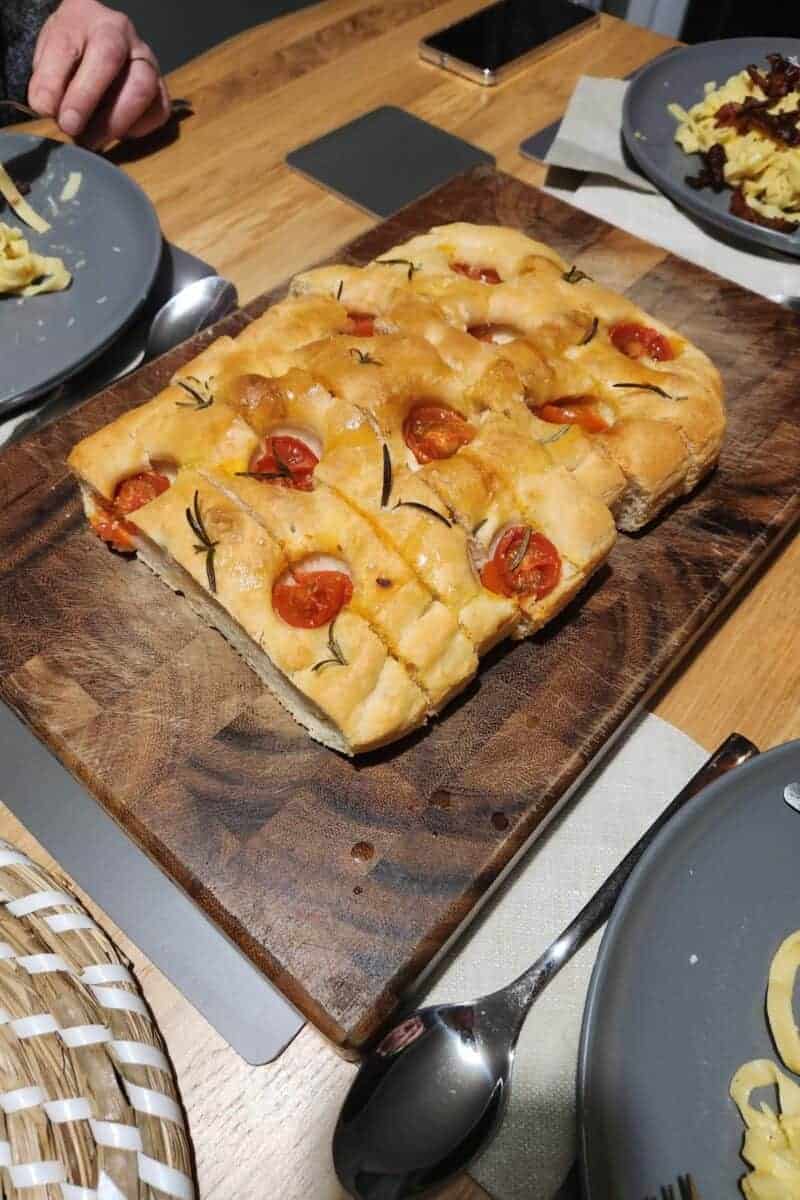 focaccia with cherry tomatoes and rosemary.