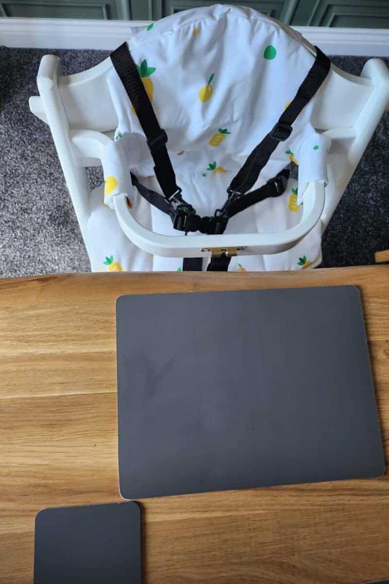 highchair for toddlers next to the table.