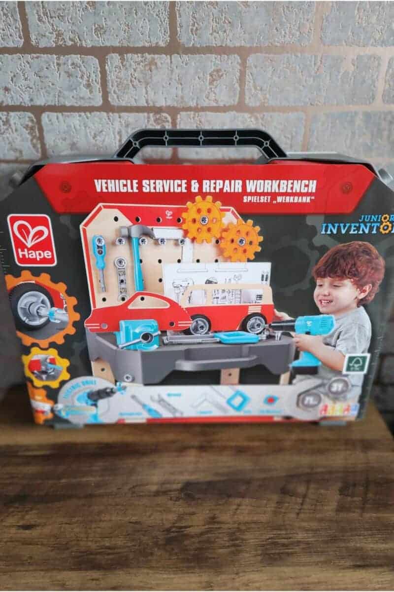 Hape childrens wooden workbench in a carry case.