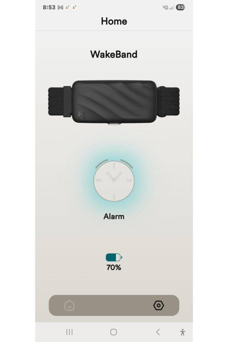 A smartwatch interface displays "WakeBand" at the top, an image of a black Homedics Wakeband, an alarm clock icon labeled "Silent Alarm," and a battery indicator showing 70% charge—perfect for a quick review.