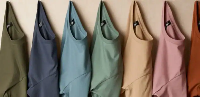 AS Colour blank t-shirts hanging in earthy tones for custom printing