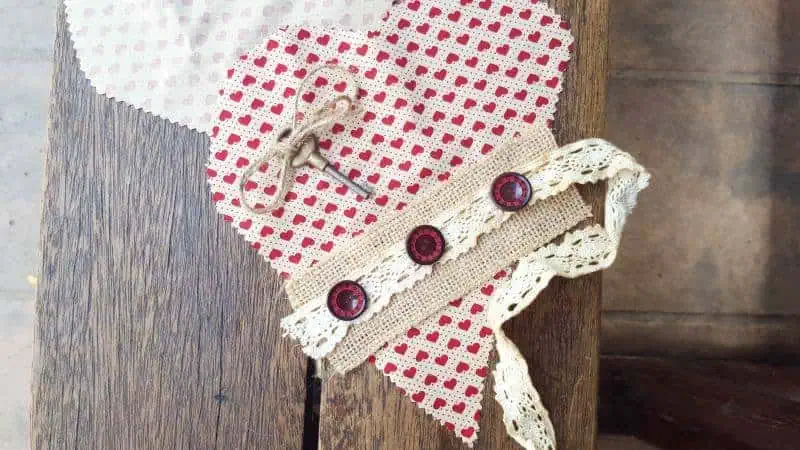 Place your fabric scraps on the heart, keeping it simple and innocent