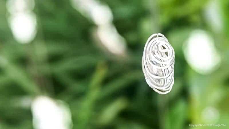 We'll show you how easy it is to make beautiful wire wrapped glass beads and add them to a repurposed wind chime