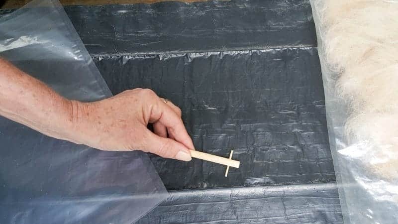 Drill a hole in a dowel and insert a toothpick to make a spindle