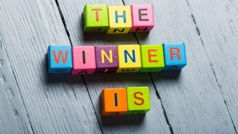 Why is it important to enter competitions and search for discounts with a positive attitude?