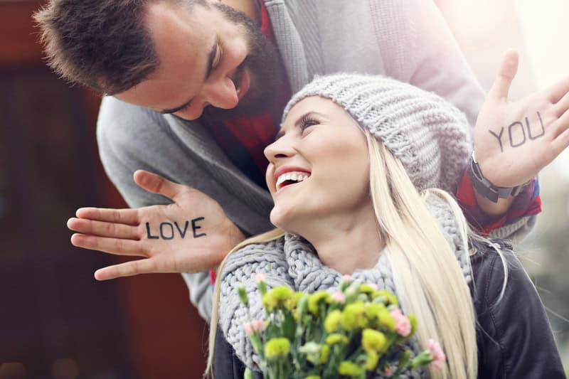 Cute loving couple sharing a moment because they each knew where to find quality marriage minded singles.