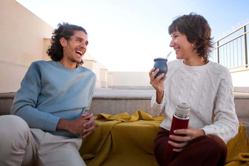 Autistic adult having a relaxed conversation with a friend, illustrating beginner dating confidence