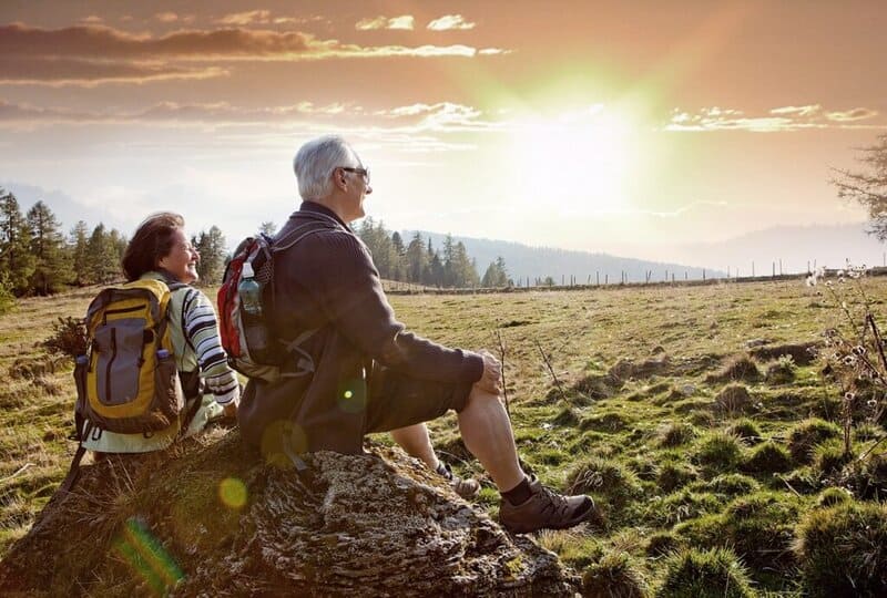 Active seniors hiking outdoors — HUR fitness equipment supports healthy aging