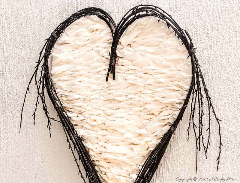 Use old sheet in this twig heart loom to create something special for your decor