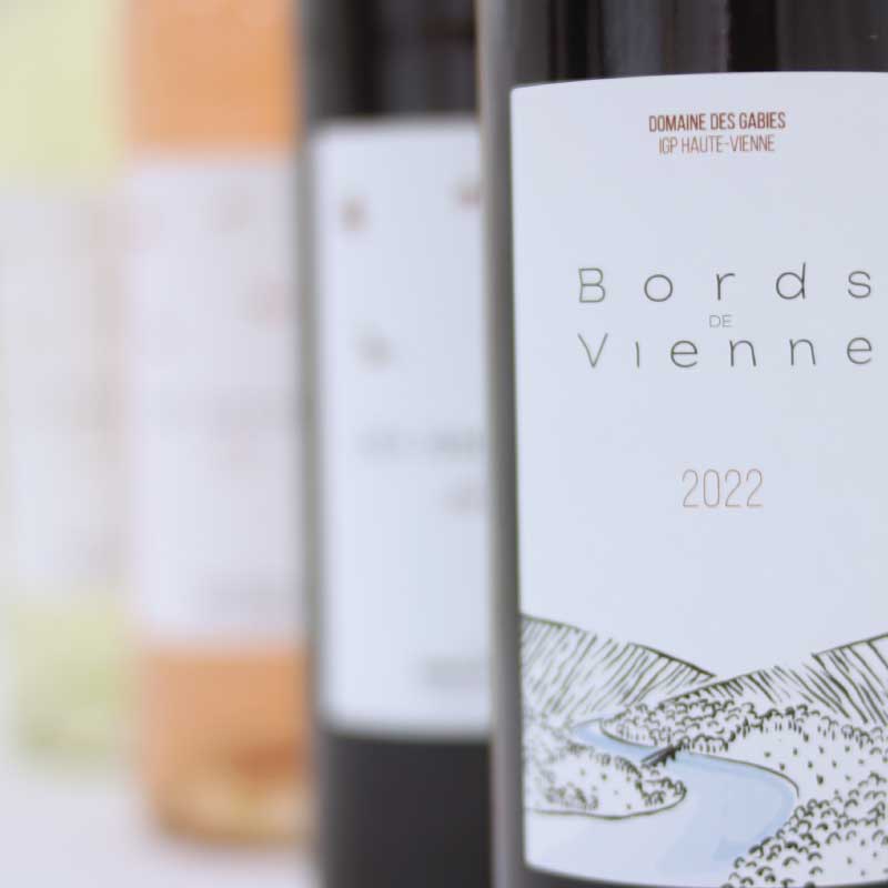 Raccourci de l'accueil du Domaine des Gabies, domaine viticole en Haute-Vienne, vers la page Nos vins : bouteilles Bords de Vienne et Graulaus