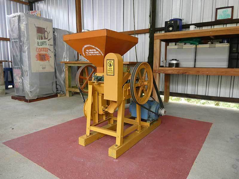 An older flywheel coffee batch weigher at Finca Tantum Galapagos, Ecuador