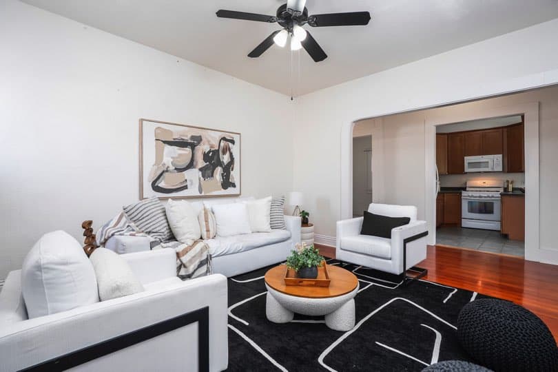 A view of the living room looking toward a doorway into the kitchen at 1932 C Street in Golden Hill.