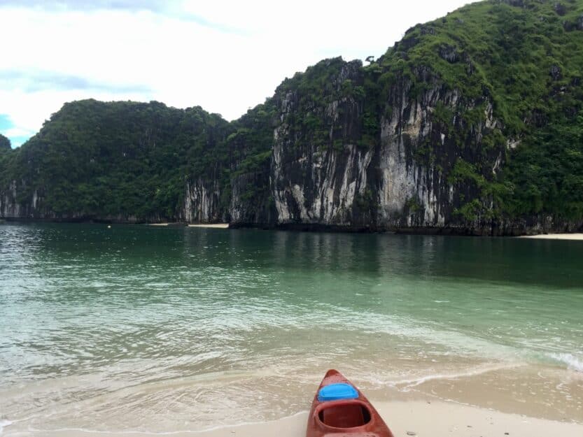 Exploring Beaches by Kayak in Ha Long Bay, Vietnam Exploring Beaches by Kayak in Ha Long Bay, Vietnam