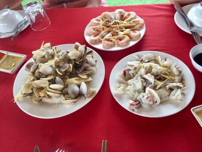 Lunch on Cat Ba Ventures Tour in Halong Bay, Vietnam Lunch on Cat Ba Ventures Tour in Halong Bay, Vietnam. Squid, Clams, and Prawns