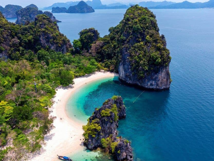 Aerial View of Railay Beach in Thailand Aerial view of white sand and limestone cliffs on Railay Beach in Thailand