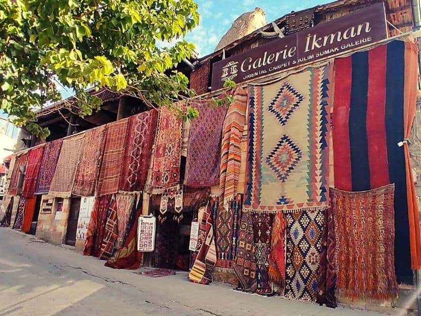 Carpet Shop in Goreme, Cappadocia Lots of colourful rugs displayed outside carpet shop in Goreme, Cappadocia