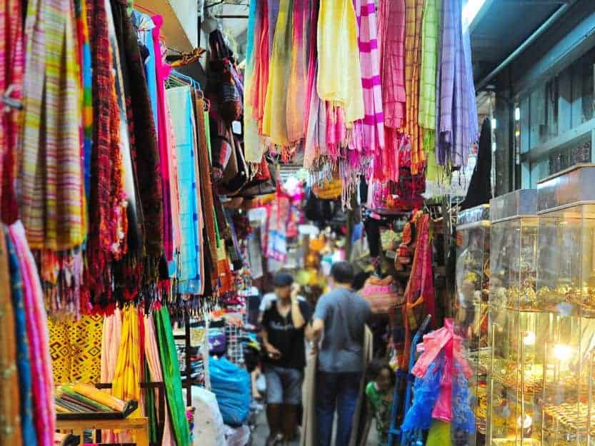 Chatuchak Market in Bangkok, Thailand Colourful scarves and gold in Chatuchak Market in Bangkok, Thailand