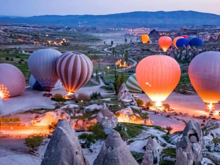 Hot air balloons Lit up at Launch Site in Cappadocia Hot air balloons all lit up at launch site in Cappadocia