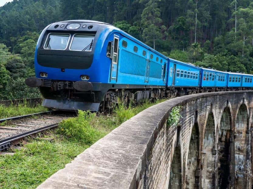 Kandy to Ella Train on Nine Arches Bridge in Sri Lanka Blue Kandy to Ella Train on Nine Arches Bridge in Sri Lanka