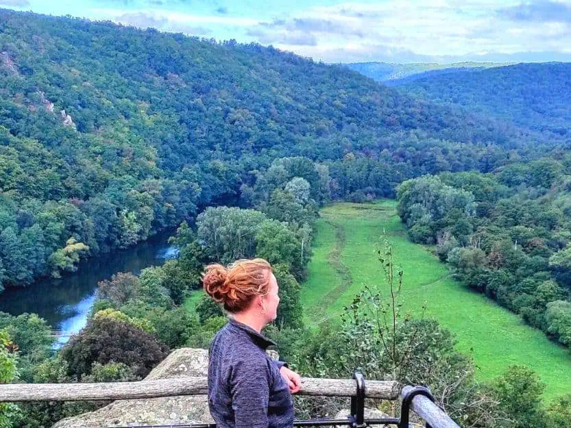 Podyji National Park Near Znojmo in Czech Republic Tanya looking out over green hills and trees in Podiyji National Park and Dyje River