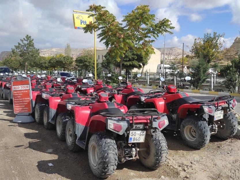 Quad Bikes Cappadocia Red quad bikes lined up in Cappadocia