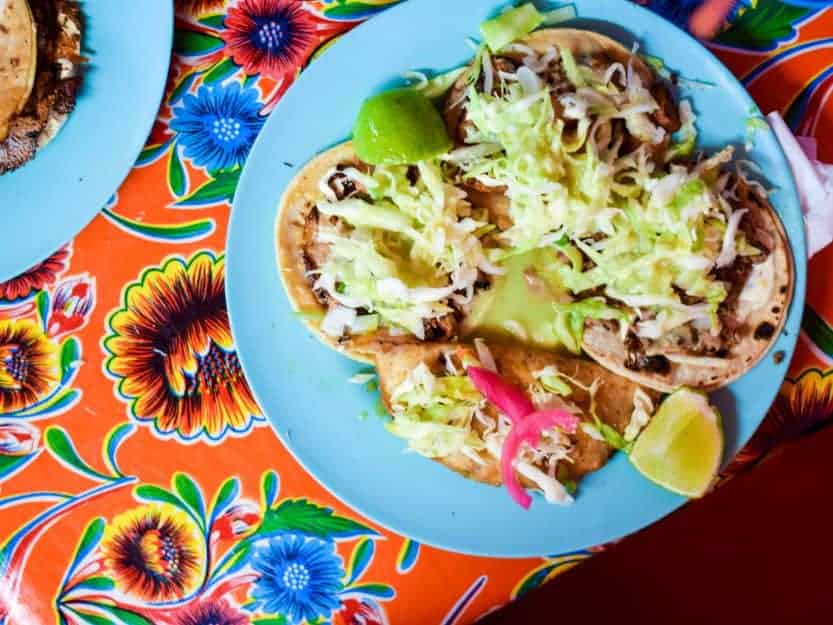 Tacos Al Pastor in Tulum in Mexico. Tacos Al Pastor in Tulum in Mexico, served on a colourful table cloth.