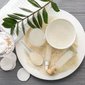 Healthy rice water with cosmetic supplies on table