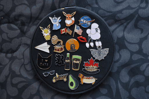 How to Wear Custom Pins to Add Flair to Your Outfit