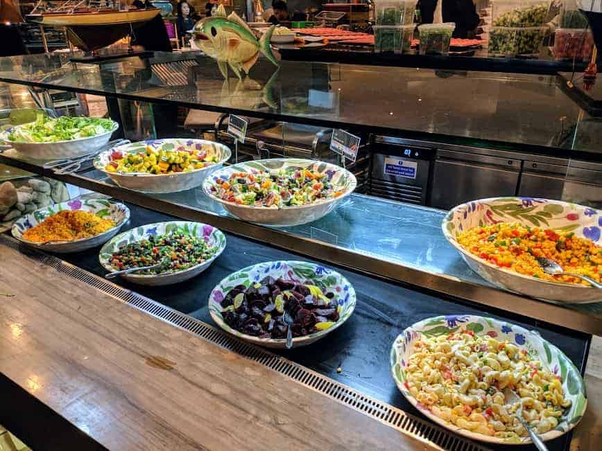 bowls of pasta and rice salads