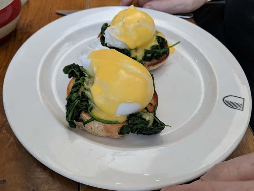 eggs florentine on a white plate.