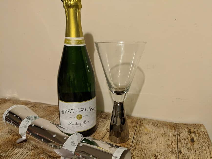 Wine, glass and cracker ready for Christmas dinner