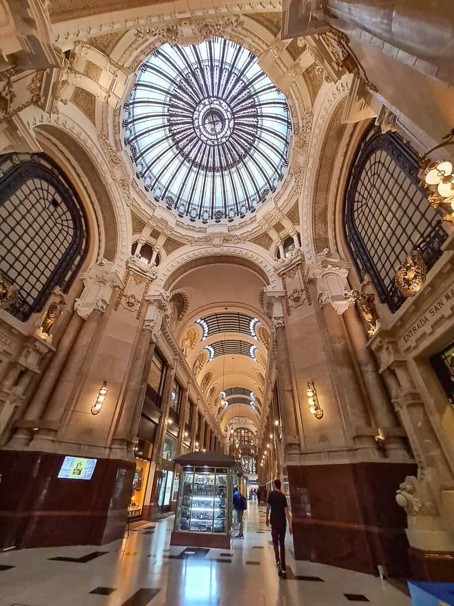 Galería Güemes is a hidden gem in Buenos Aires, featuring intricate architecture and a breathtaking glass dome ceiling, a must-visit for architecture enthusiasts
