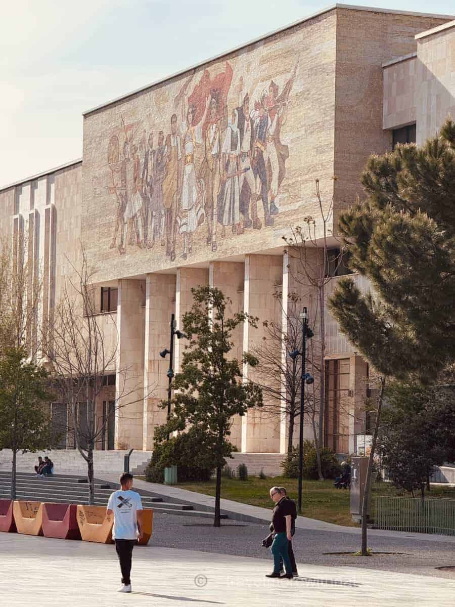 Tirana's National History Museum is another building that features columns and art on the exterior, and worth a look on your walking tour of Tirana.