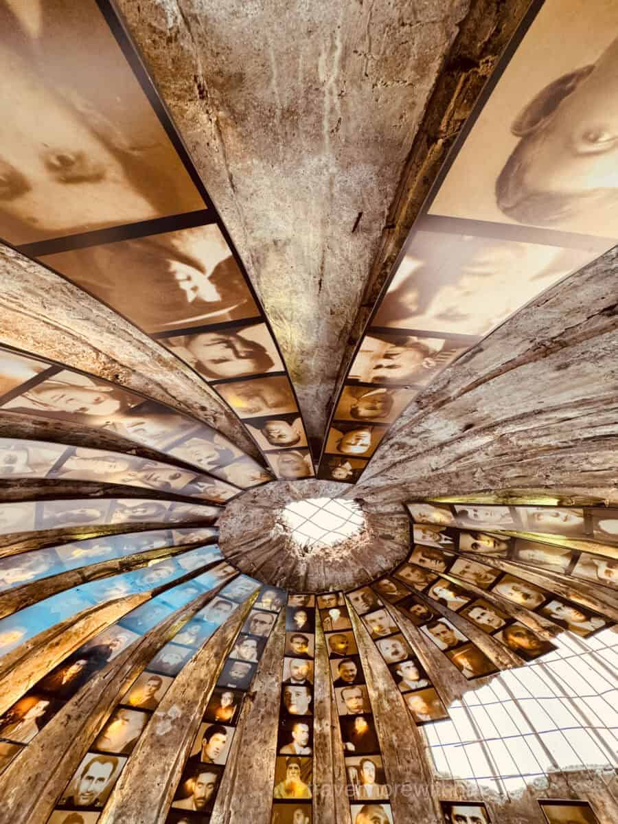 The ceiling of Bunk'Art2 is domed and covered in old photographs. I recommend at least peeking inside during your Tirana city walk.