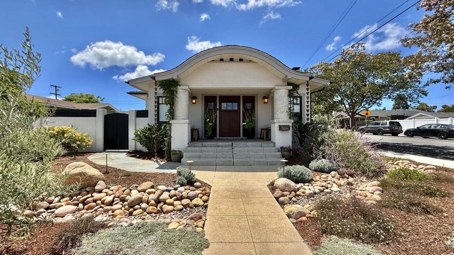 Front view of a Craftsman-style home in North Park, San Diego, with a curved walkway and drought-tolerant landscaping.