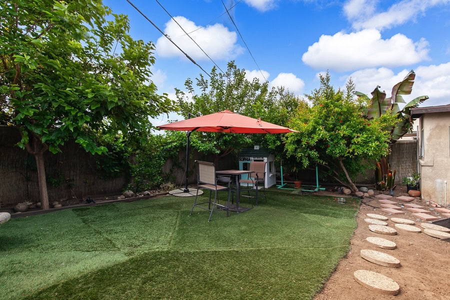 2632 Boundary St - Backyard with Grass and Lush Trees