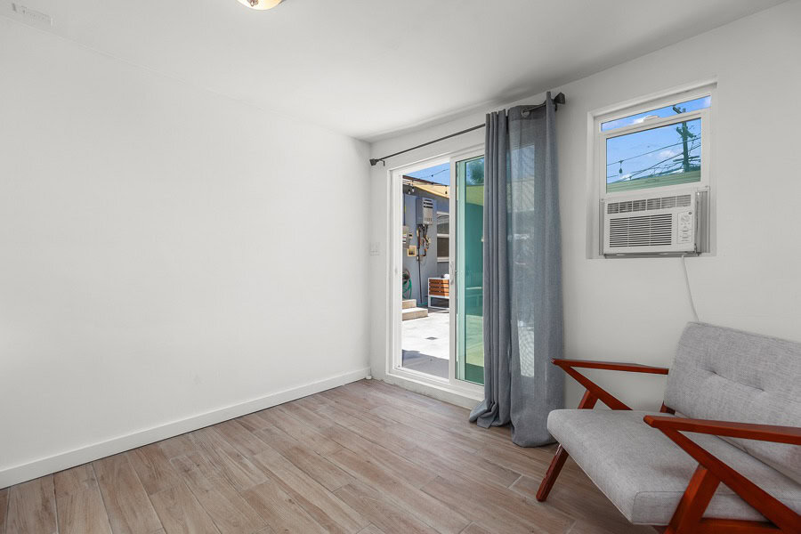 2632 Madison Avenue - Lounging Area with Sofa and an AC