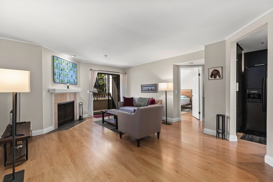 1950 Upas St Unit 308 - View of the Living Room Area with Fireplace and a Balcony