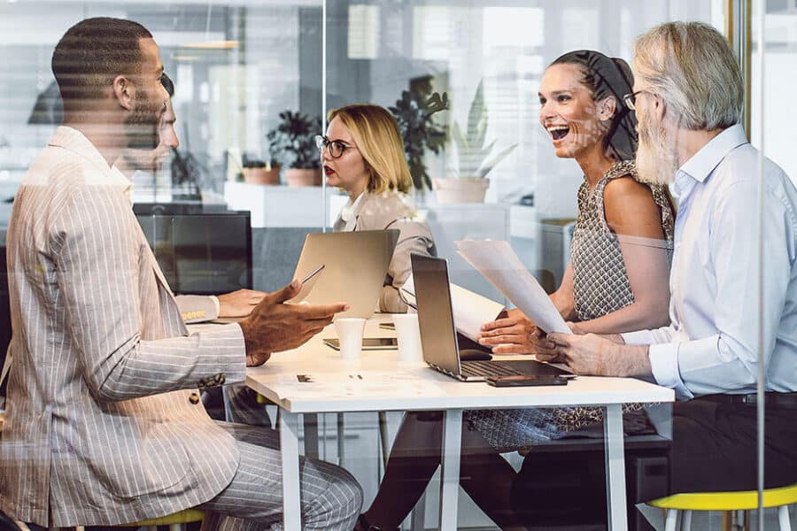 Business Interruption Insurance Blog Feature Image of office workers