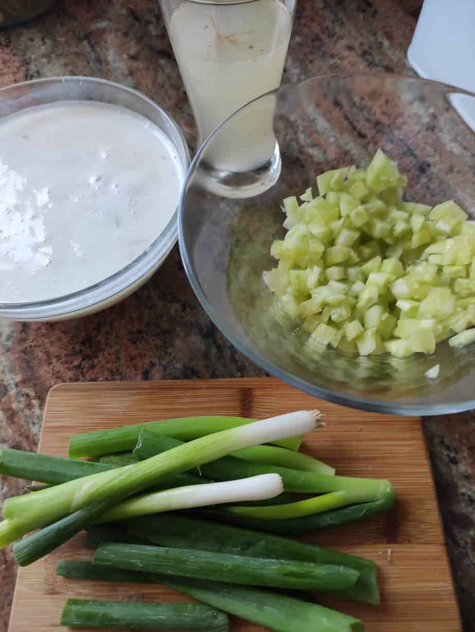 Chopped cucumbers, chives and maslanka.