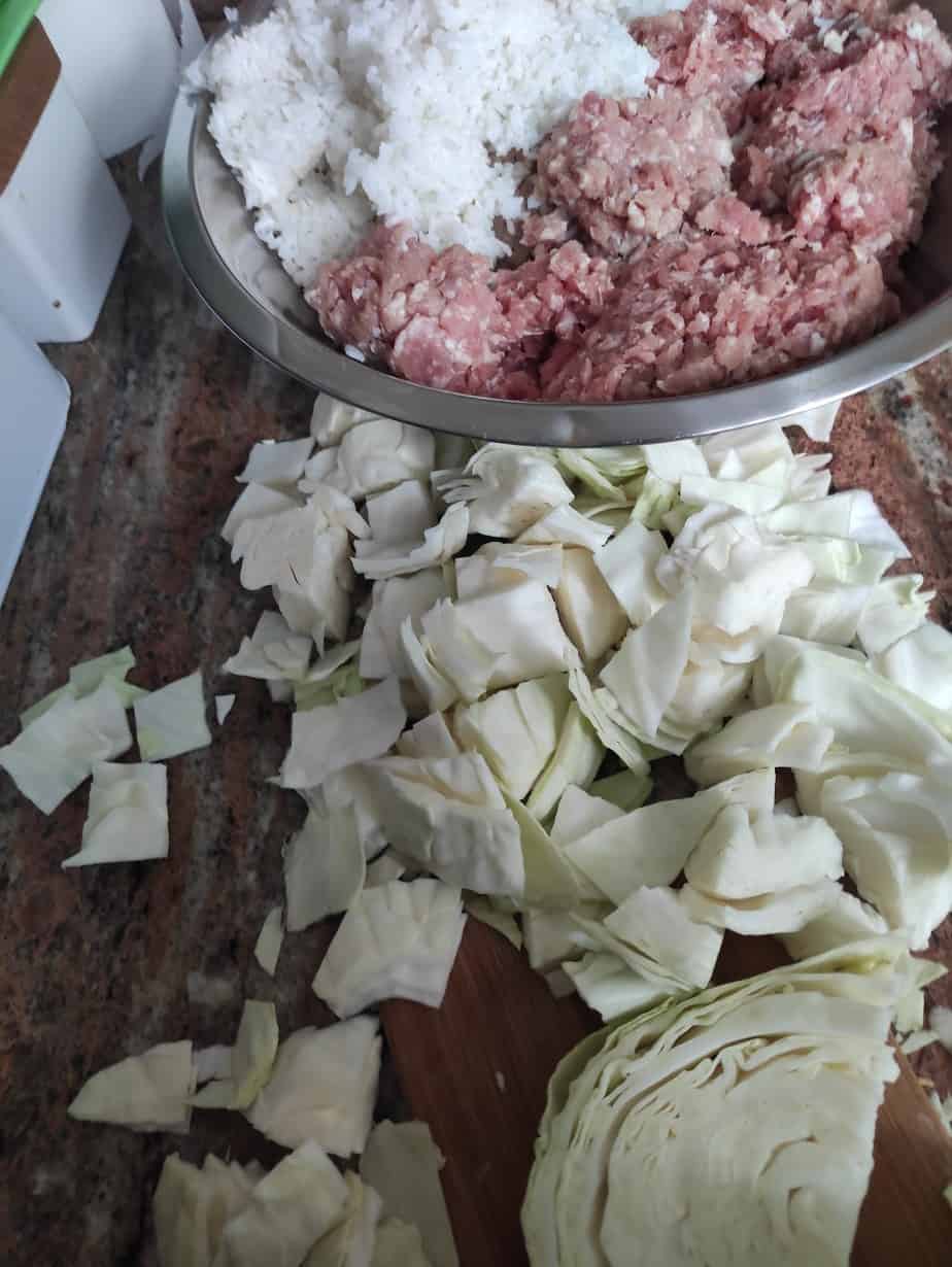 Chopped cabbage, rice, and minced meat.