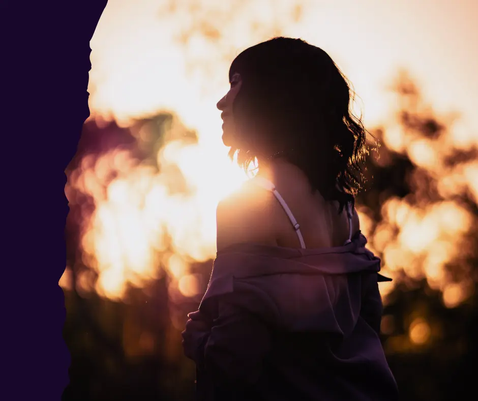 Happy woman gesture on the sunset