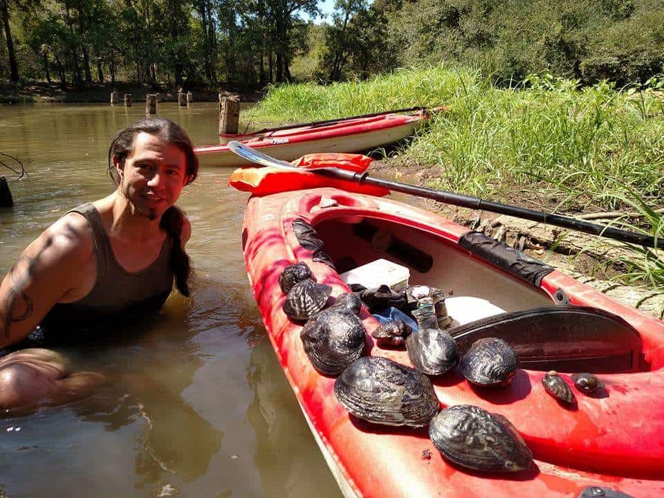 12:14 PMClaude responded: EDGE Engineering biologist in a river alongside a kayak carrying multiple freshwater turtles collected during an aquatic wildlife survey — field documentation …EDGE Engineering biologist in a river alongside a kayak carrying multiple freshwater turtles collected during an aquatic wildlife survey — field documentation of turtle species relocation or population monitoring as part of environmental compliance and construction impact assessment work.