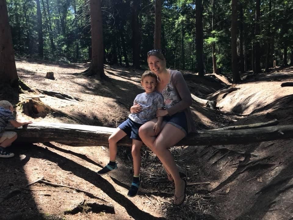 me and Jake sat on a log in Alice Holt Forest
