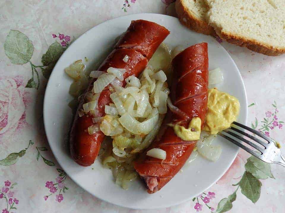 Sausage with fried onions.