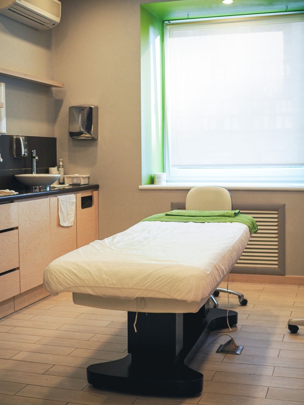 a hospital bed near the window