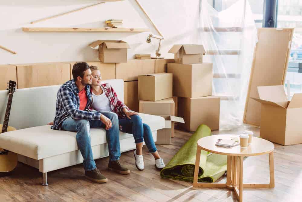 married couple moving into their first home