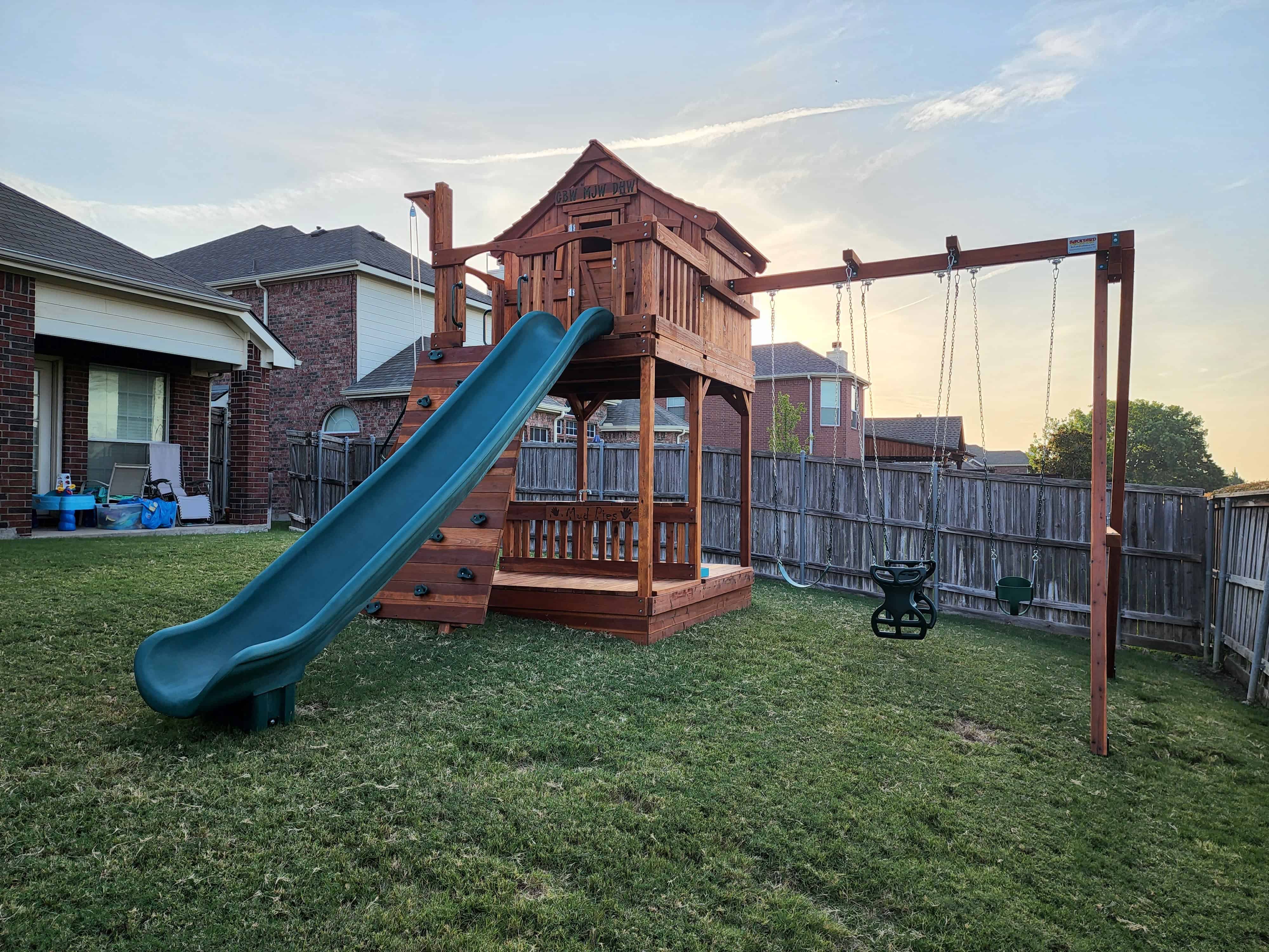 Upper cabin swing set with sloped yard Swing Set with unlevel or sloped yard