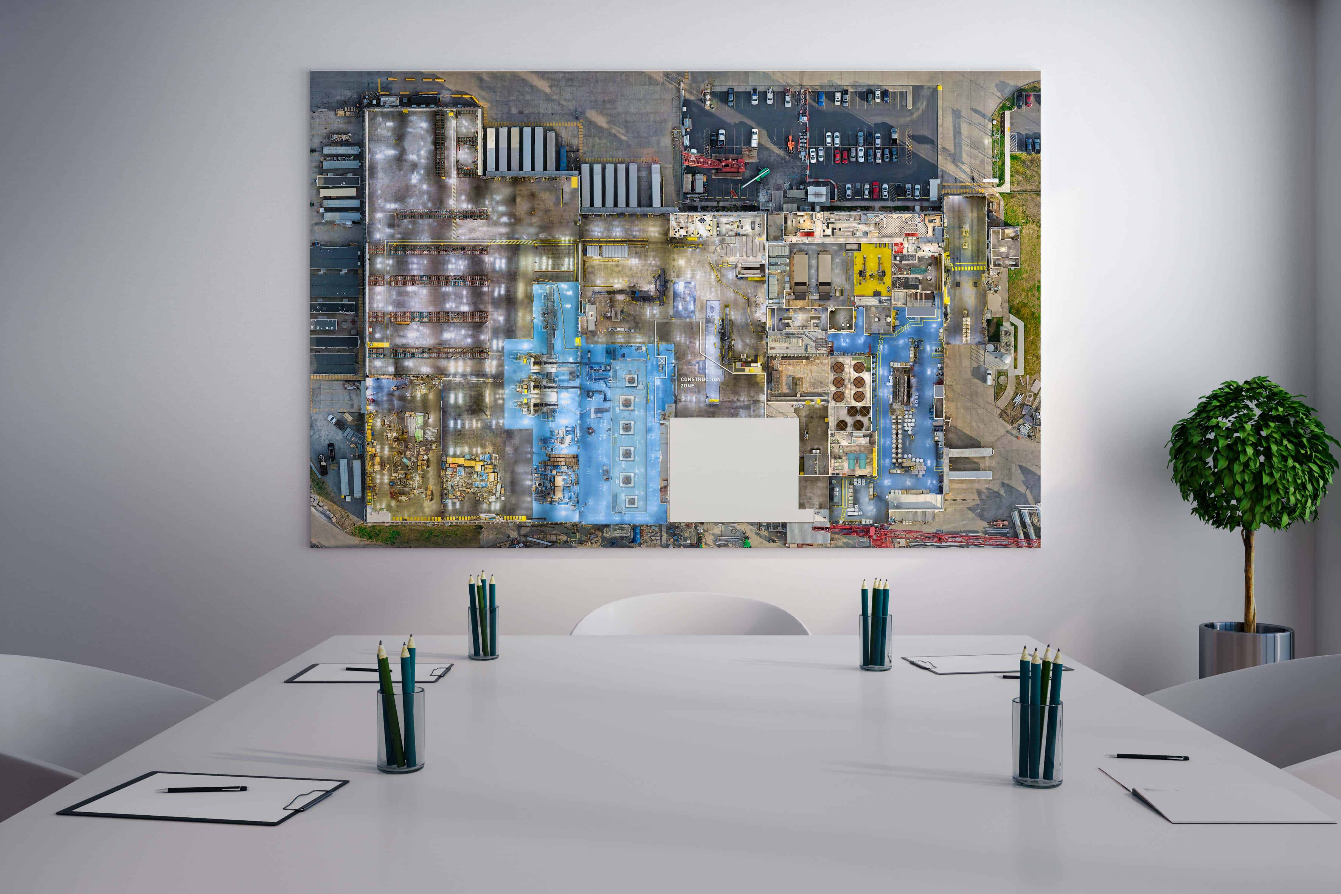 Conference room displaying a factory map.